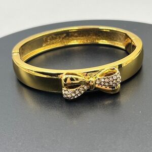 Betsey Johnson Vintage Gold Plated
Hinged Rhinestone Pave Bow Love‎ Notes Bangle